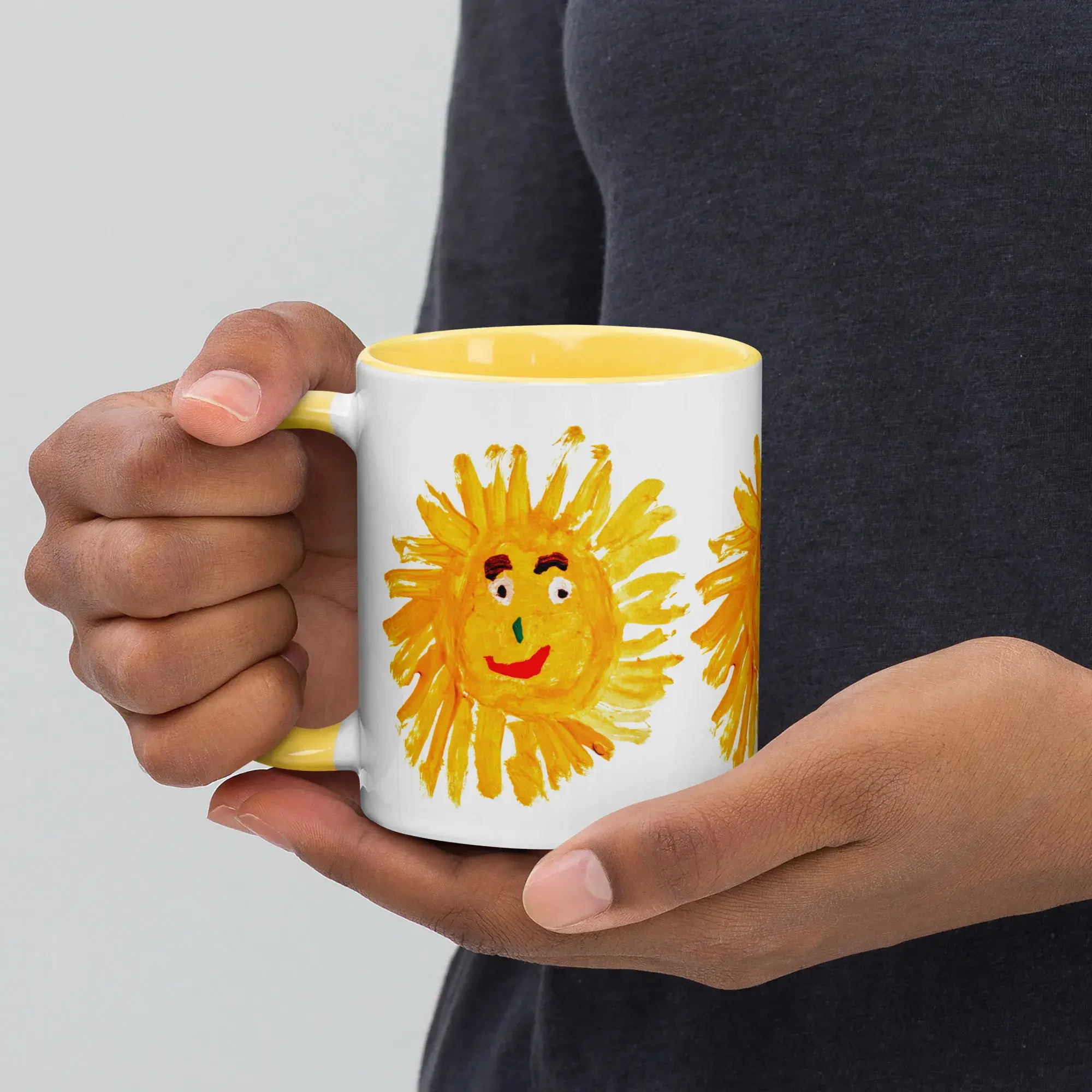 A lifestyle shot of the bright yellow sun tea mug on a linen table runner surrounded by fresh morning citrus fruits